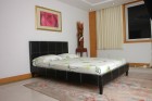 Odessa King Size Bed in Black Faux Leather